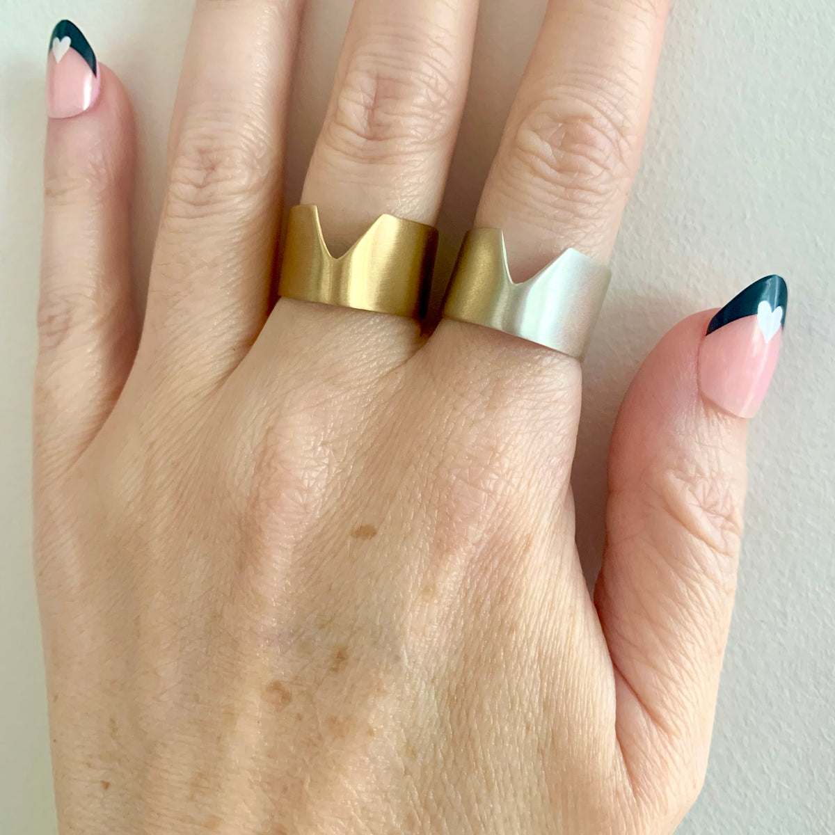 Chevron Ring in recycled sterling silver and eco-friendly brass, worn on hand – Black Heart Jewelers