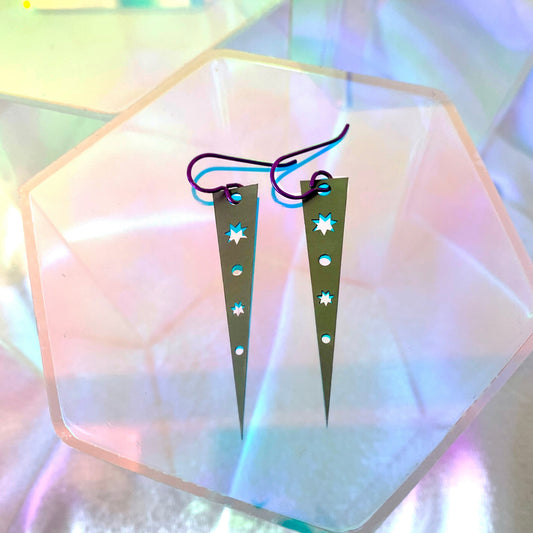 Spike Earrings in hypoallergenic niobium on colorful geometric prism props – Black Heart Jewelers